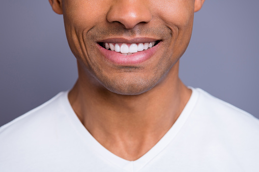 Close up of man smiling with teeth